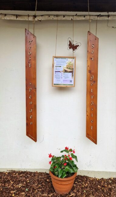 Trost spenden -Schild
